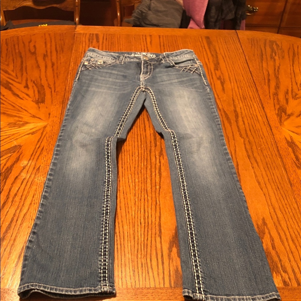 Paisley Sky Blue Jeans. SMOKE FREE HOME. 30”waist 30”inseam tag Size 6